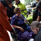 A rescue team evacuates Melanie Clampitt in Bellaire, Texas on Aug. 28